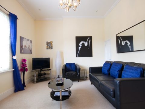 Open plan living area of this split-level, self catering apartment